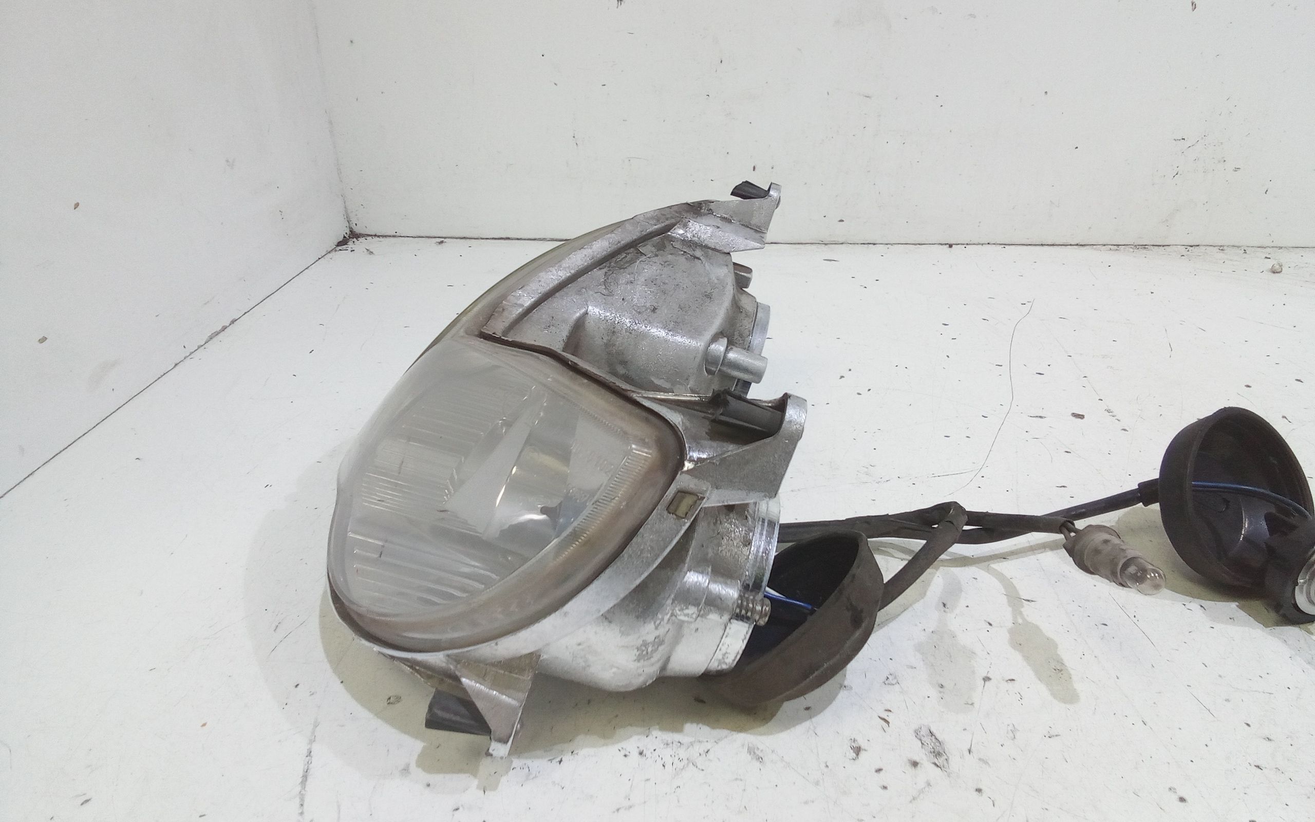 Faro anteriore Aprilia Sport City 200cc  (04>08)